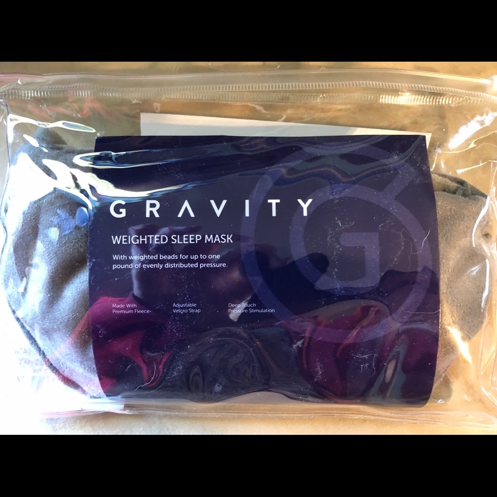 Gravity weighted sleep mask